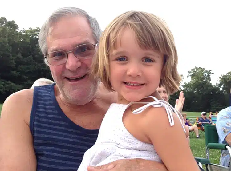 Opa and Lily (granddaughter) at an outdoor concert.