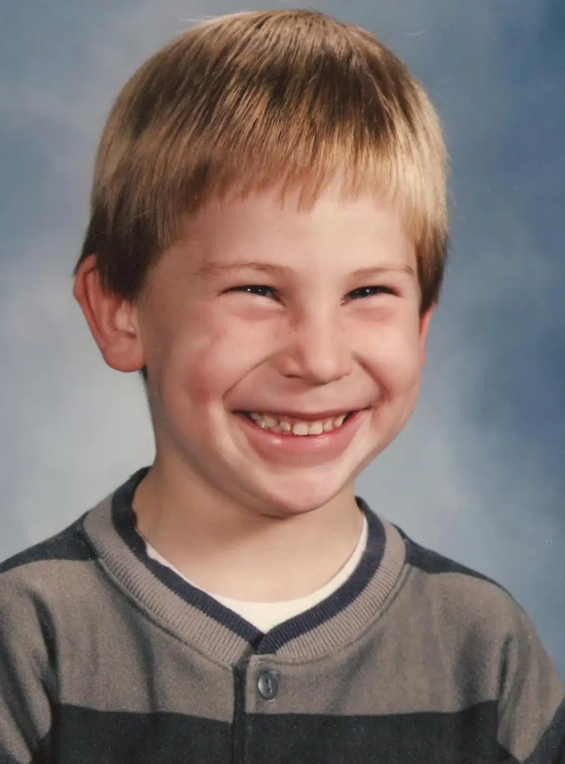 Christopher's kindergarten portrait - age 5. He loved to be with his friends at school.